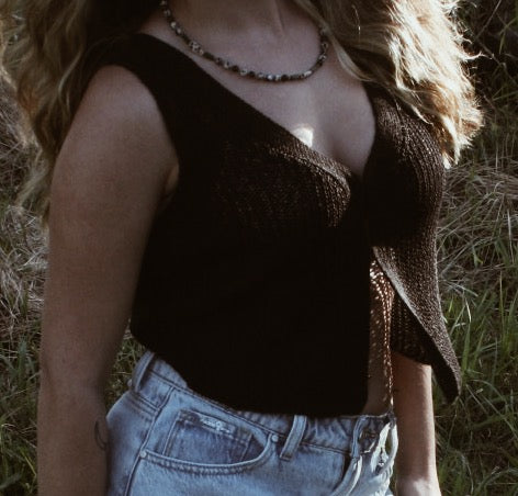 Black knitted tank crop top
Clasp front
