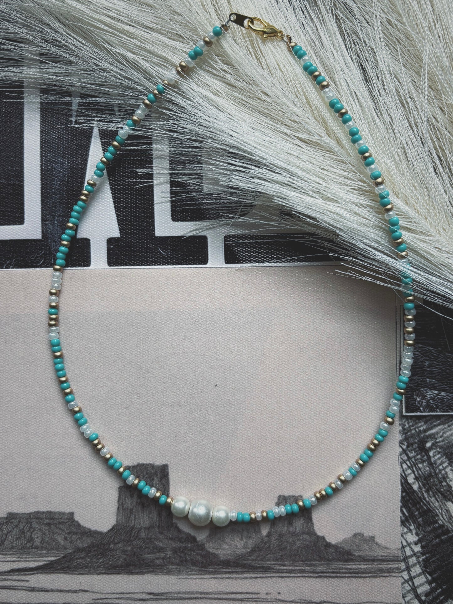 Golden pearl necklace